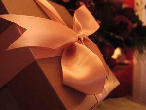 Holiday gift box with a satin ribbon
