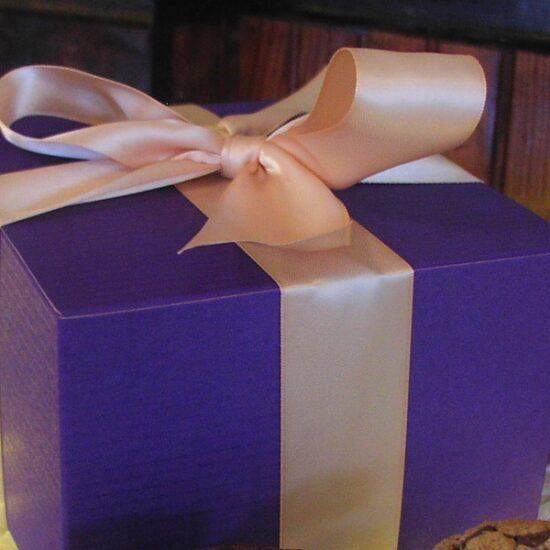 A royal purple Holiday gift box of cookies