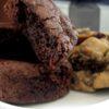Gourmet cookies and chocolate brownies in a small gift box with a black ribbon