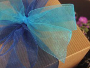 This standard gift box of gourmet cookies features a blue ribbon