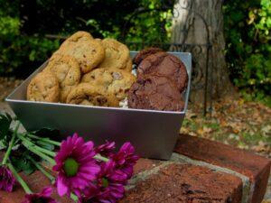 A large gift basket of gourmet cookies and chocolate brownies