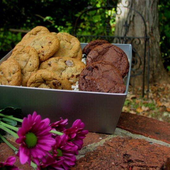 A large gift basket of gourmet cookies and chocolate brownies