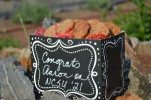 A large custom gift basket of gourmet cookies and brownies