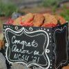 A large custom gift basket of gourmet cookies with a hand-written message